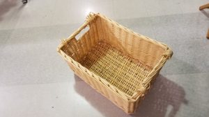 Wicker basket on floor