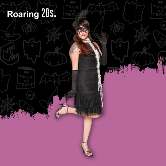 Roaring 20s female dressed in flapper dress from Goodwill